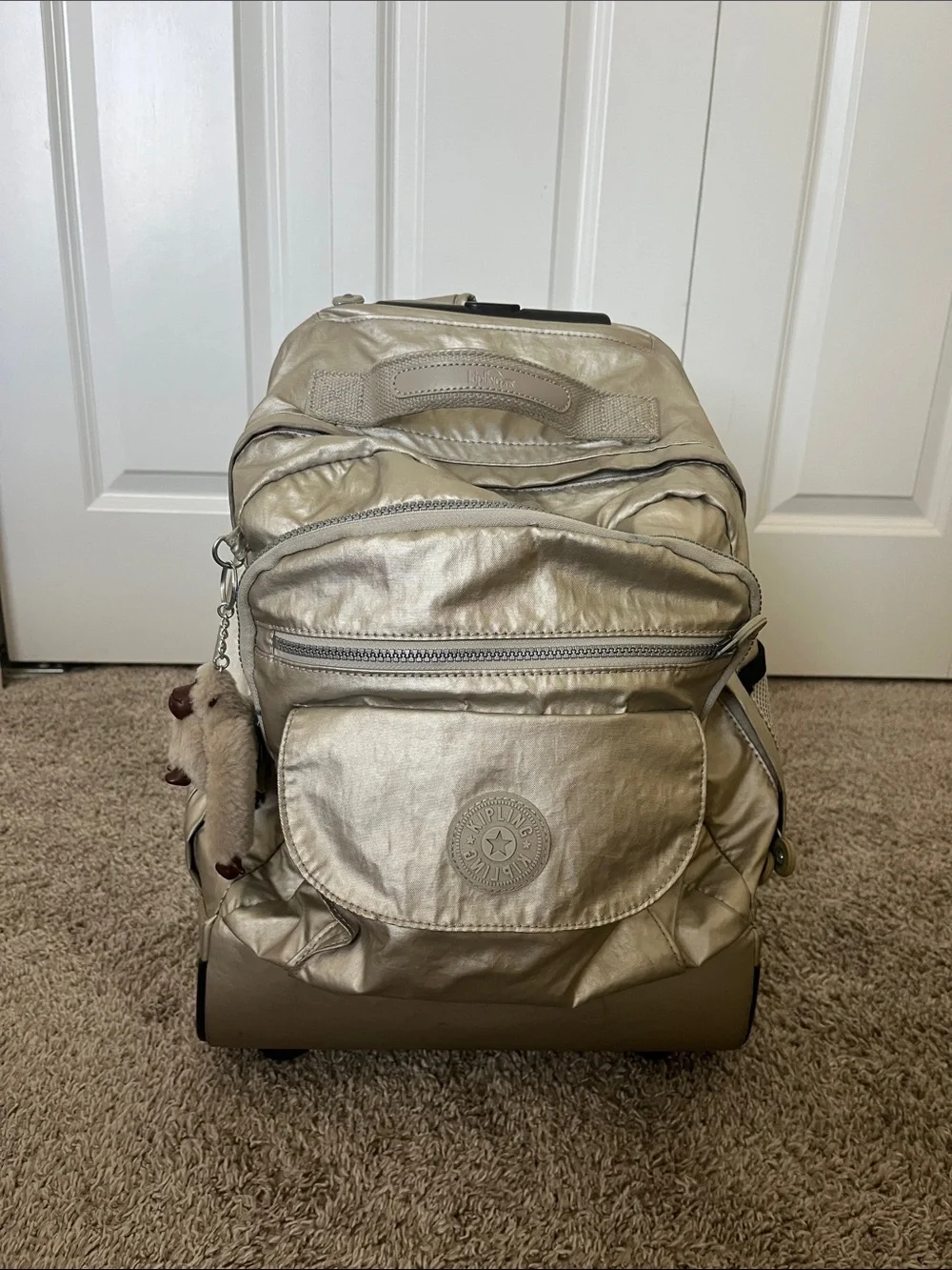 Kipling Metallic Champagne Rolling Backpack - Shimmering Gold